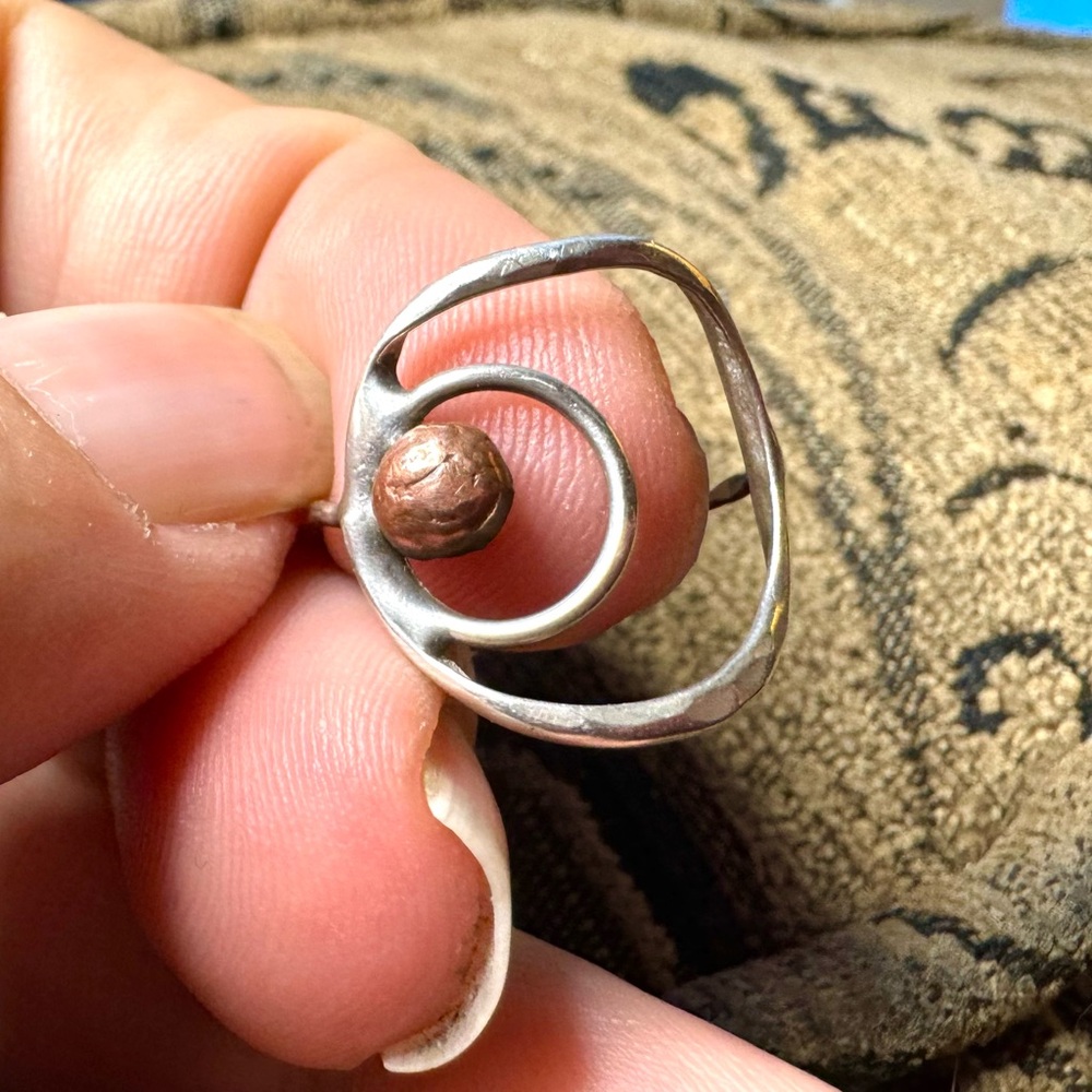 Handcrafted silver and cop ring.